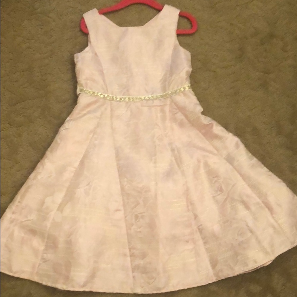 Never worn. Brand new w/tags. Daughter outgrew.